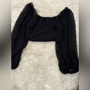 Cropped puffy long sleeve blouse